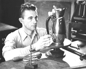 Frederick Miller fitting a handle to a pitcher